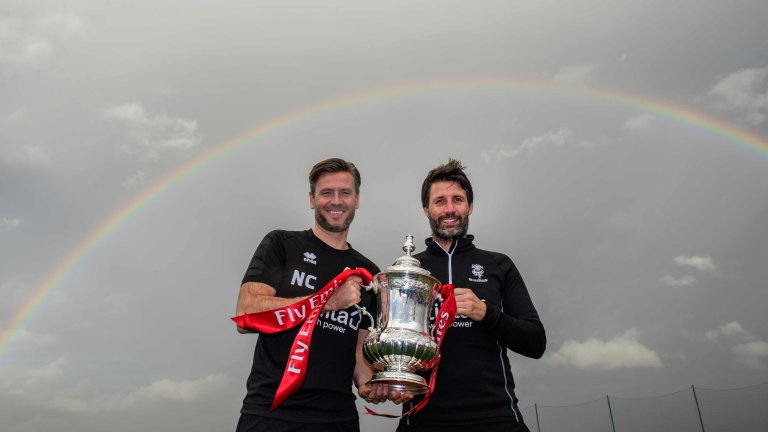 Chris Vaughan Photography - PR and communications images | Nicky and Danny Cowley hold the Emirates FA Cup as a rainbow forms above them.