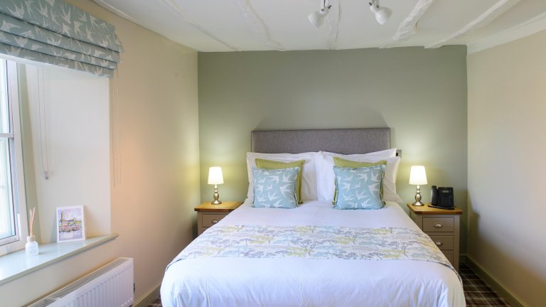 An image of a refurbished bedroom at the Old Kings Head.
