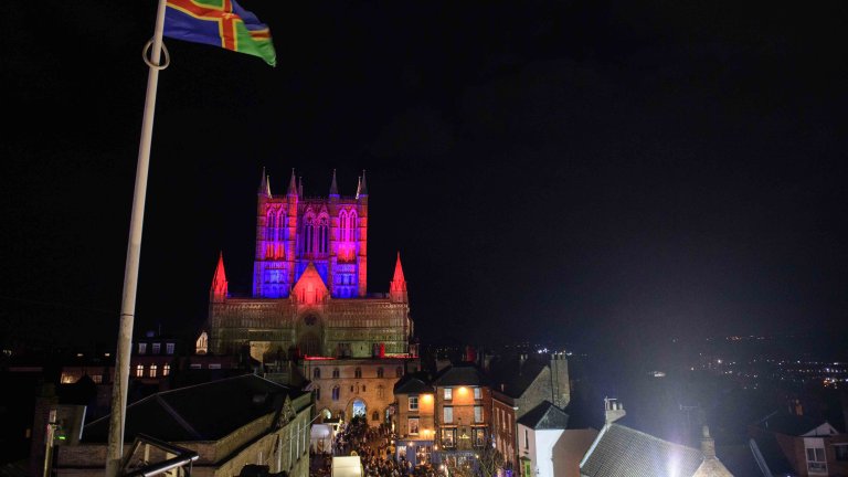 Chris Vaughan - case study images: Lincoln Cathedral | Lincoln Cathedral illuminated purple at night.