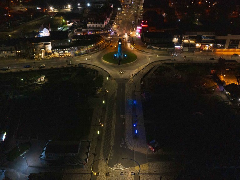 Chris Vaughan Photography - drone images | An aerial image of lights on Tower Esplanade in Skegness, Lincolnshire have been lit blue and yellow in solidarity with people in Ukraine.