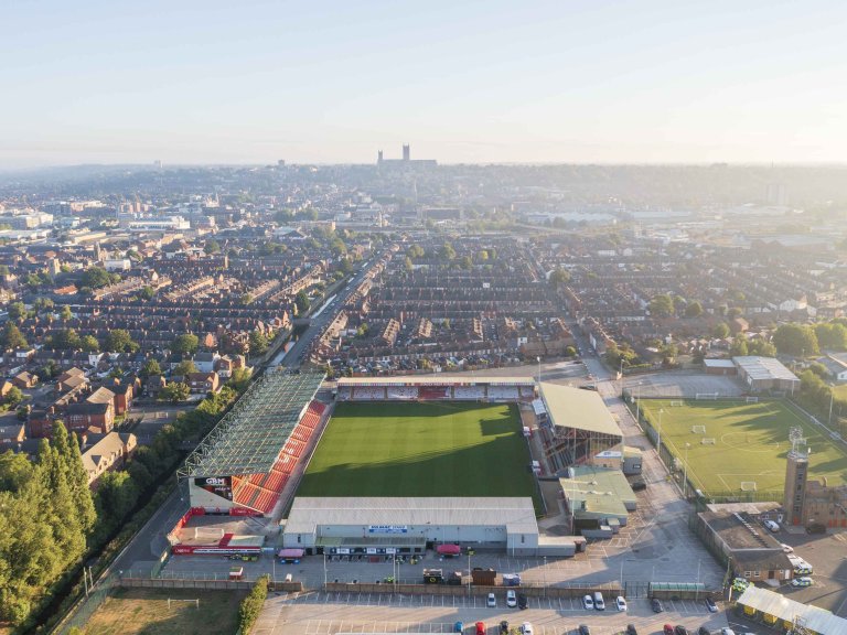 Chris Vaughan Photography - drone images | An aerial image of Lincoln City's LNER Stadium looking towards Lincoln City.