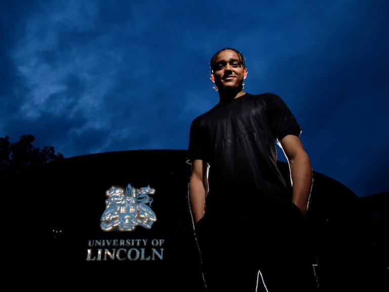 Lincoln City's Jovon Makama wearing the Imps&rsquo; new University of Lincoln sponsored third kit.