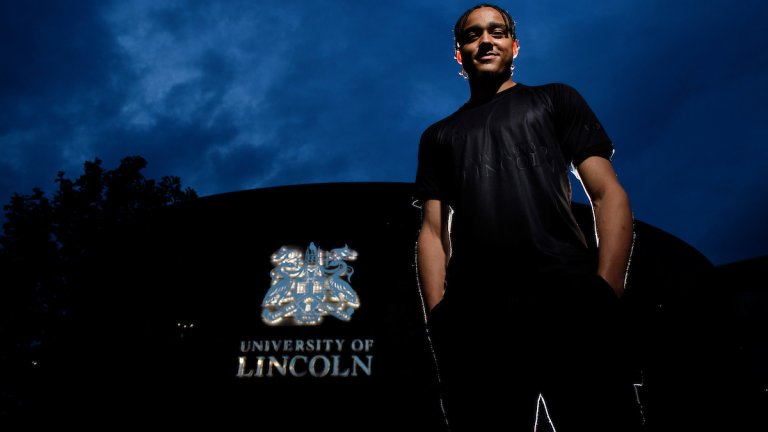 Lincoln City's Jovon Makama wearing the Imps&rsquo; new University of Lincoln sponsored third kit.