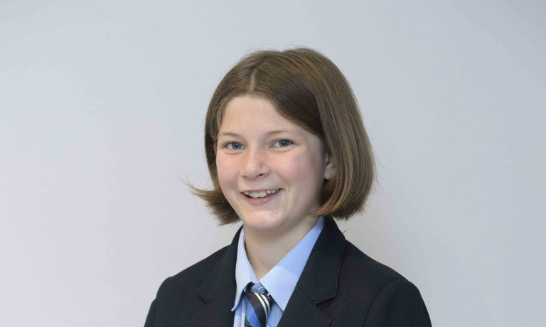 Ola wearing her school uniform.