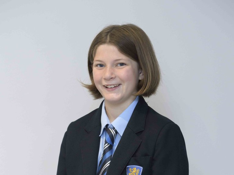 Ola wearing her school uniform.