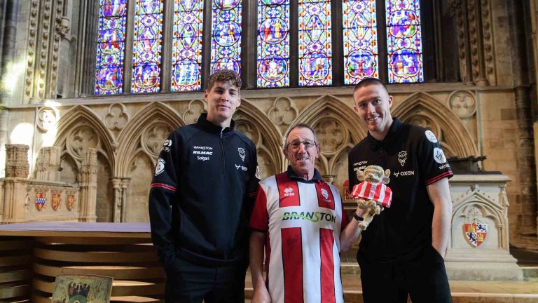 To mark Lincoln City winning the Sky Bet League One title, Lincoln Cathedral had placed a mini replica shirt on the Lincoln Imp inside the Cathedral.