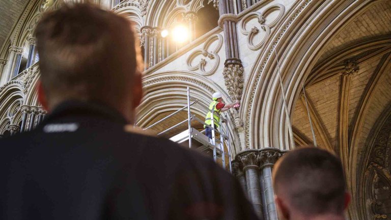 To mark Lincoln City winning the Sky Bet League One title, Lincoln Cathedral had placed a mini replica shirt on the Lincoln Imp inside the Cathedral.