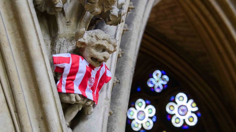 To mark Lincoln City winning the Sky Bet League One title, Lincoln Cathedral had placed a mini replica shirt on the Lincoln Imp inside the Cathedral.