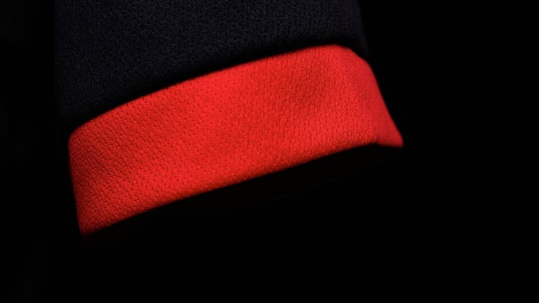 A close up of the sleeve of the 2020/21 Lincoln City away kit.