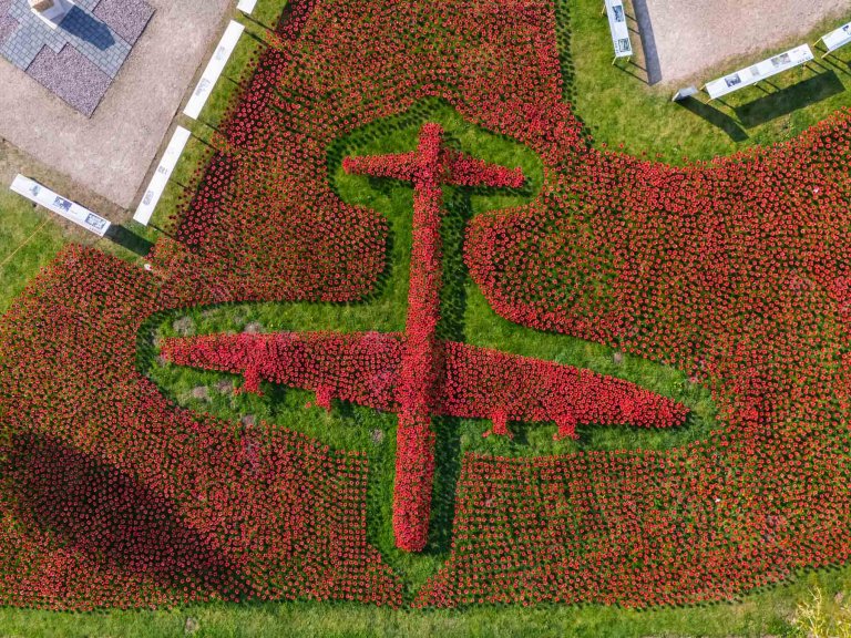 An aerial image of ceramic poppies forming the shape of a Lancaster Bomber at International Bomber Command.