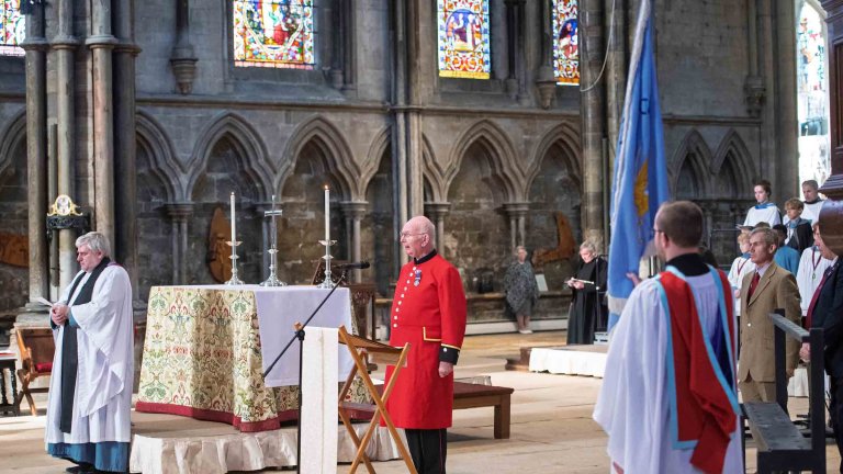 A Chelsea Pensioner speaks during Evensong at Lincoln Cathedral.