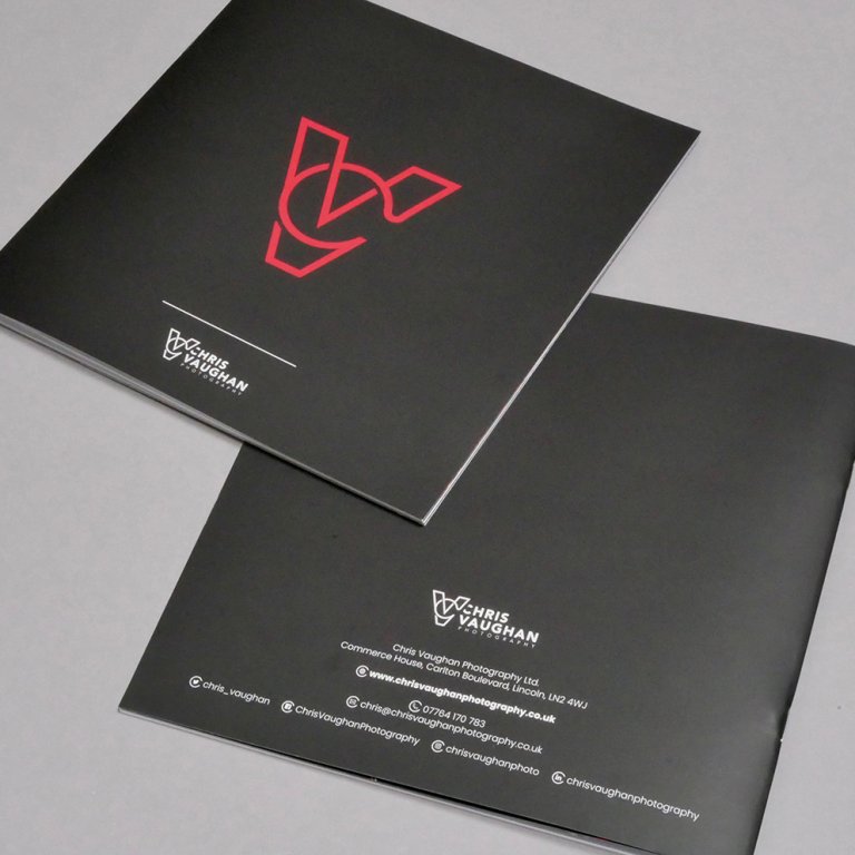 A photograph of the physical Chris Vaughan Photography marketing booklet.