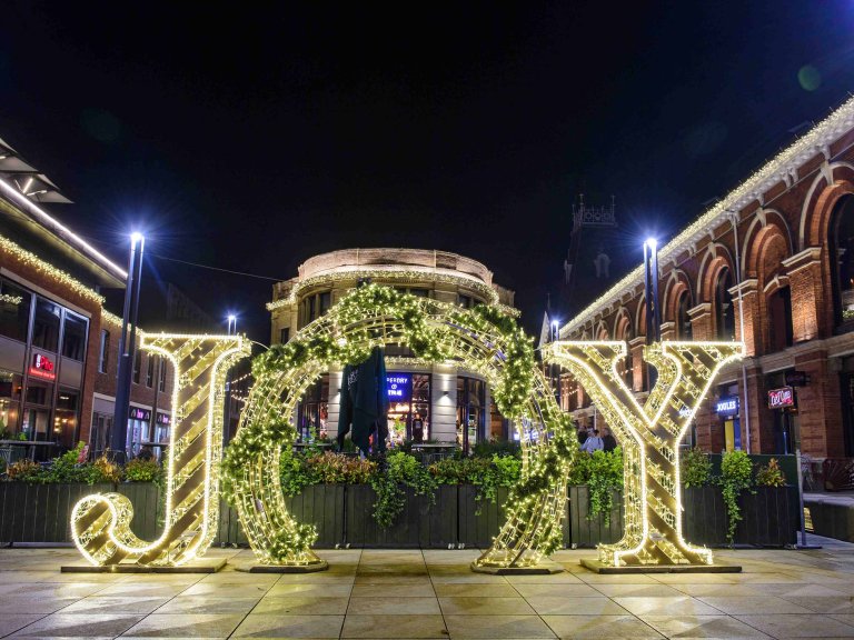 Chris Vaughan Photography - commercial photography | Christmas decorations - giant illuminated letters that spell out Joy.