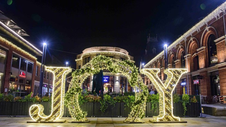 Chris Vaughan Photography - commercial photography | Christmas decorations - giant illuminated letters that spell out Joy.
