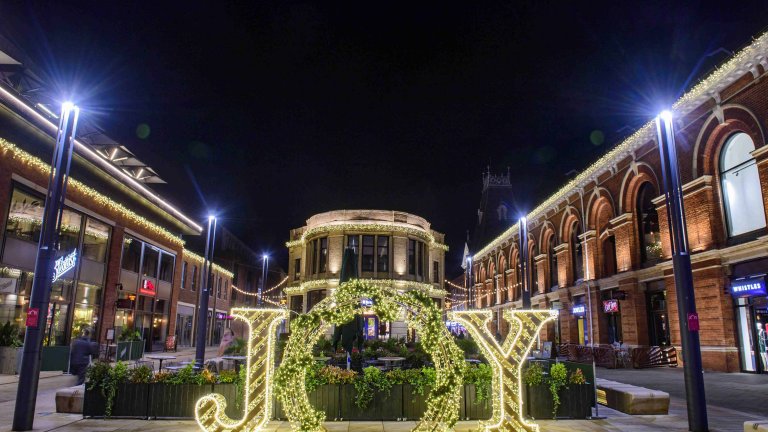 Chris Vaughan Photography - commercial photography | Christmas decorations - giant illuminated letters that spell out Joy.