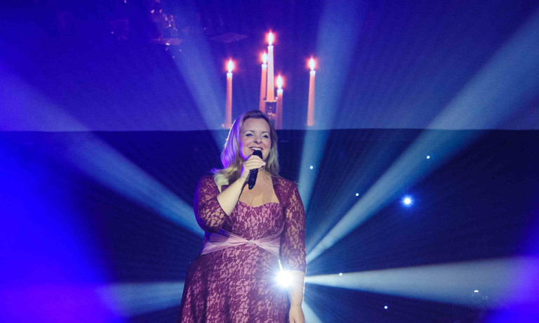 Chris Vaughan Photography - commercial images | A singer performs on stage at a Lincolnshire Co-op staff awards night.