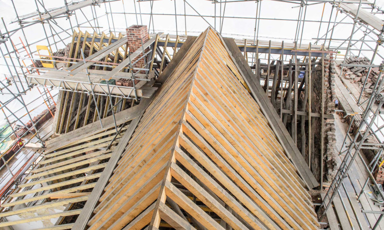 A picture looking down onto the roof of the Old Kings Head at the start of renovation.
