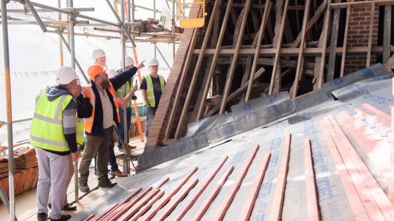 A guided roof tour during renovation works at the Old Kings Head.