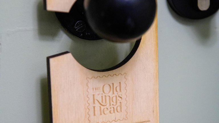 A do not disturb sign hung on the door of the refurbished Old Kings Head.