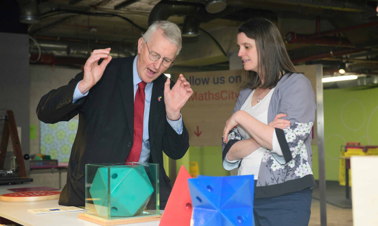 Chris Vaughan - case study images: MathsCity | MP Hillary Ben looks delighted as he completes a task.